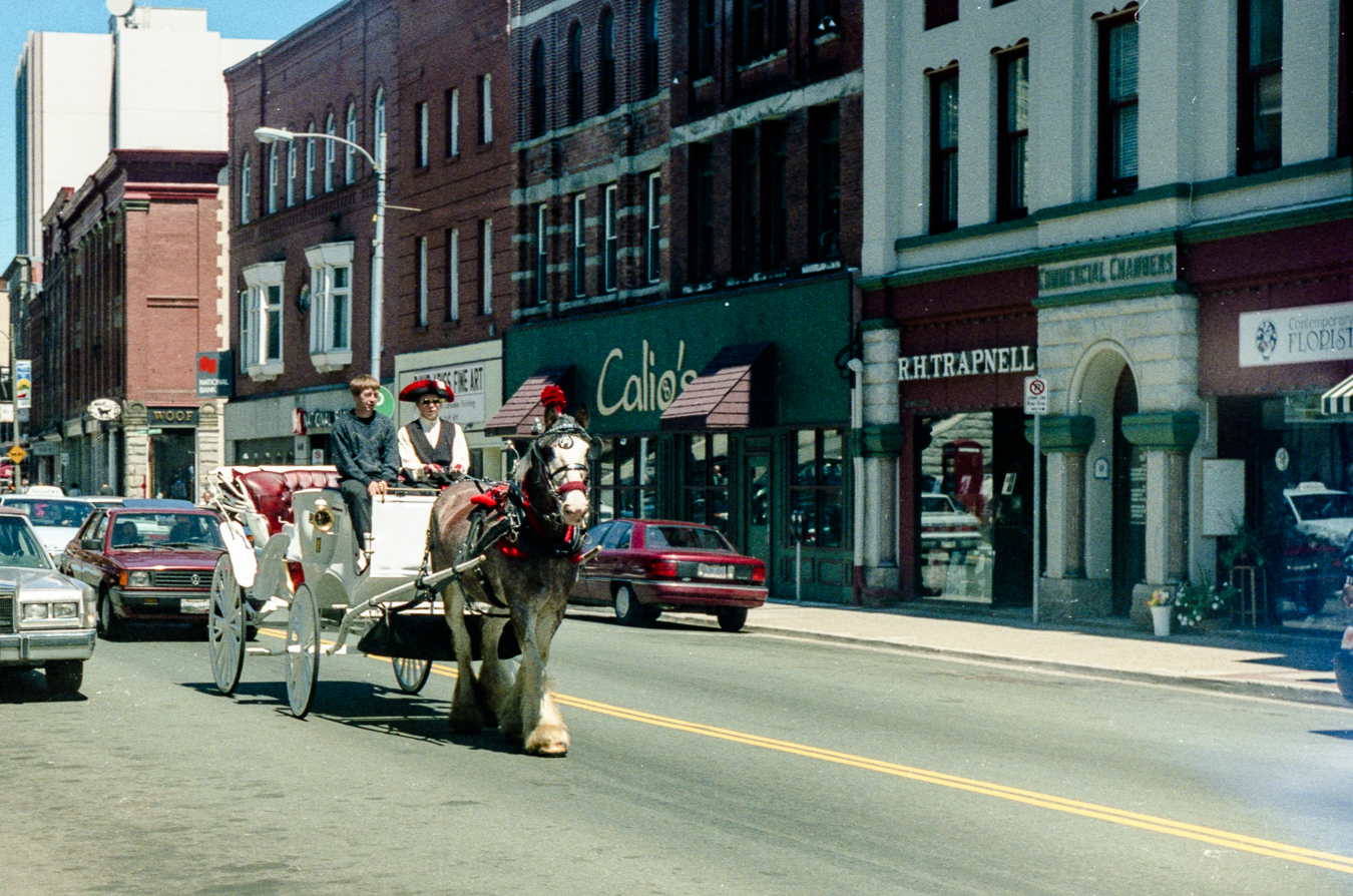 A Handsome Cab slows traffic in front of Calios - waterstreet - 1998