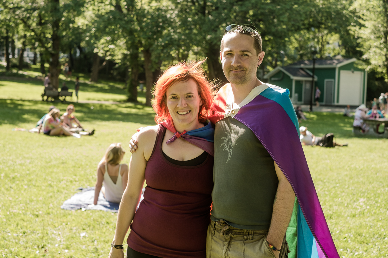 Krista and Christopher show their support by flying the flag as capes - bannerman park