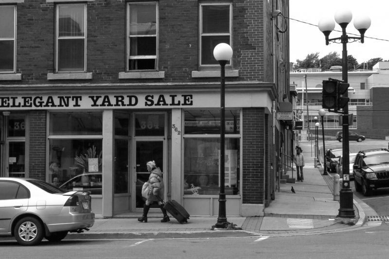 Marilyn - passed away oct of 2013 - photo 2009 - walking past the elegant yard sale which closed shortly after this was taken to make way for a Quiznos, then upstream marketing, now this space is for lease again.