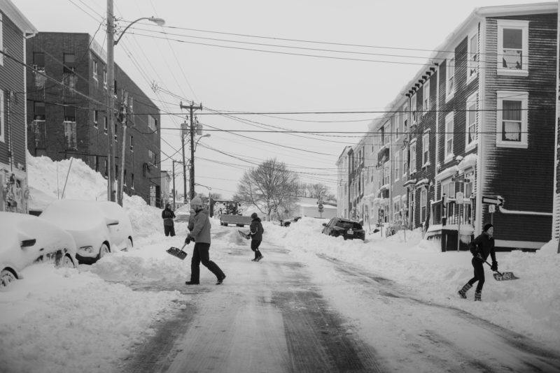 residents cleanup after a snow storm - Kings road
